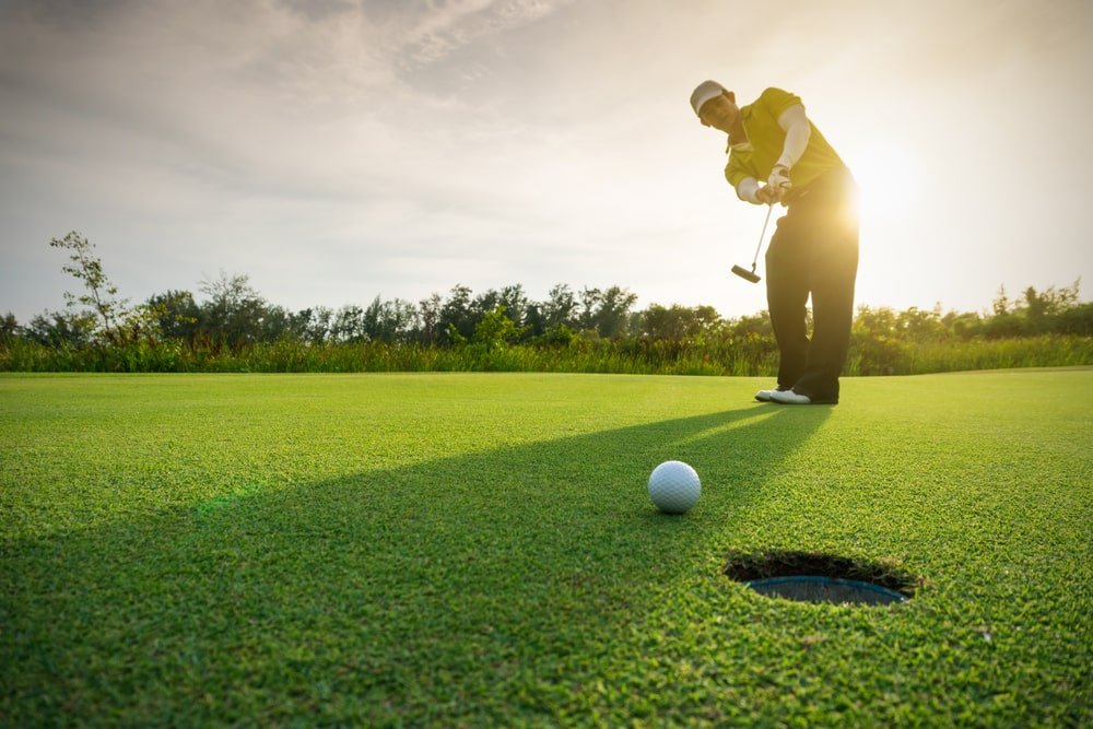 golfer putting golf ball on green - Do You Want to Improve Your Golf Game?
