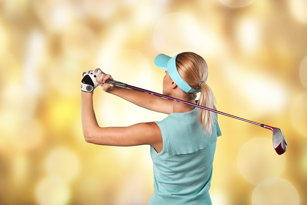 young happy woman playin golf - Do You Want to Improve Your Golf Game?
