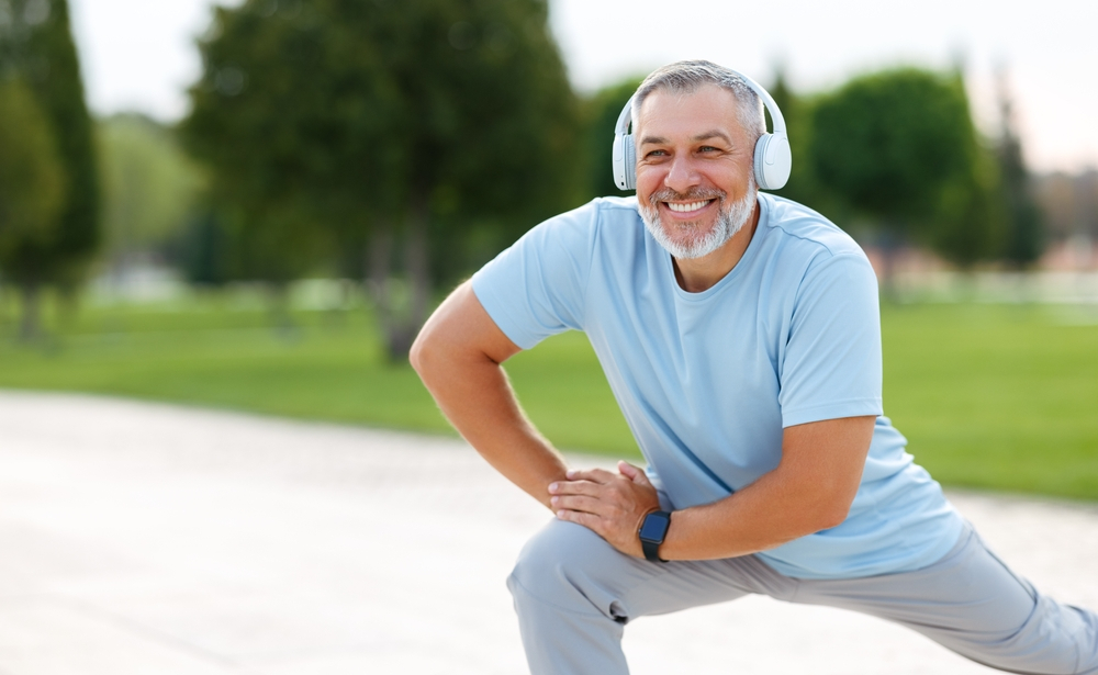 Senior man is exercising in park. Active retirement - Why Fascial Stretch Therapy is Essential for a Healthy Aging Process