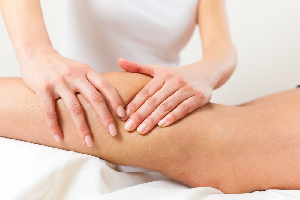 Patient at the physiotherapy gets a lymphatic drainage massage, How Does Lymphatic Drainage Complement Fascial Stretch Therapy