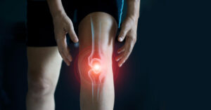 Zoom in a knee, Tendon problems and Joint inflammation. Showing the need of a massage therapist in Metairie